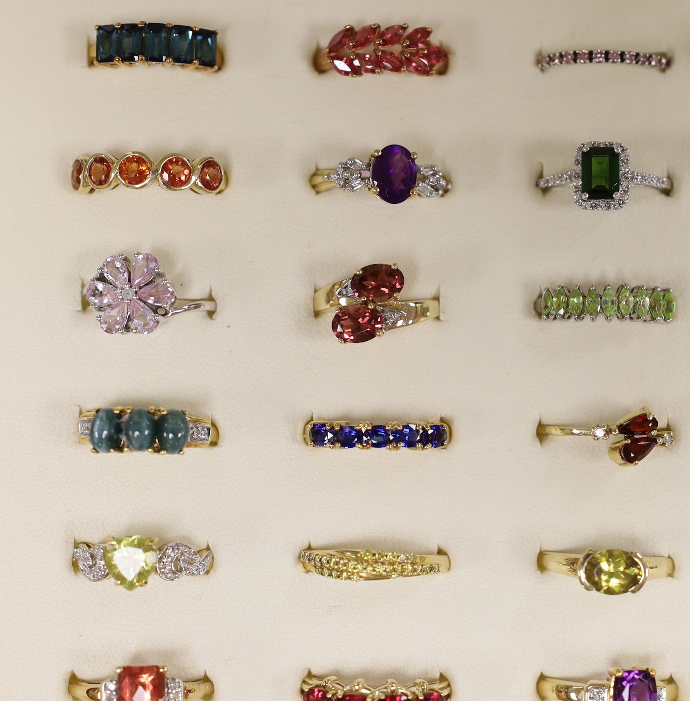 Thirty nine assorted modern 9ct gold and gem set dress rings, including amethyst and garnet and two 18ct gold and gem set rings, in ring box.